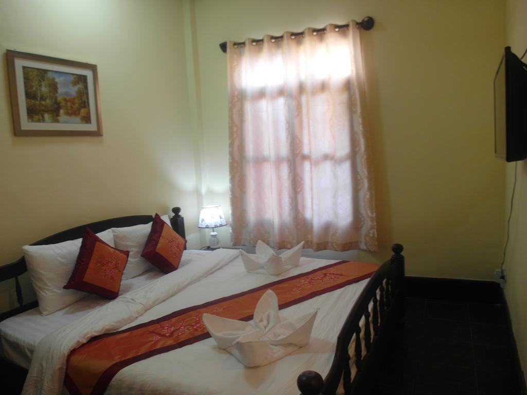 Kinnaly Place House Λουάνγκ Πραμπάνγκ Δωμάτιο φωτογραφία